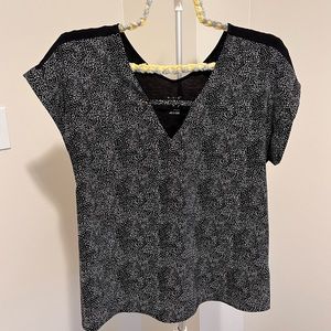 A New Day Blouse with cut out, black and white pattern, size medium